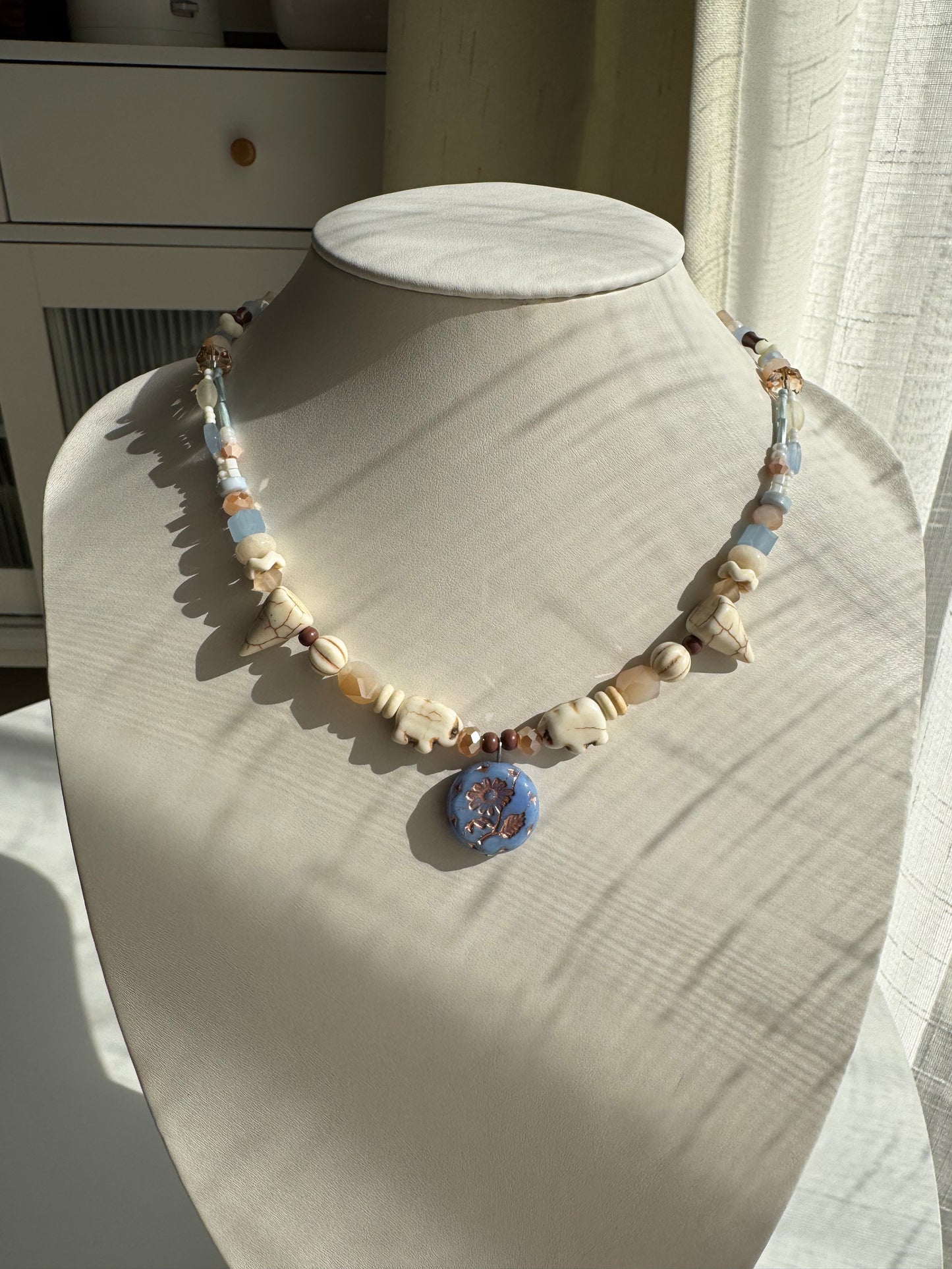 fun resort-style necklace with elephant and little magic horns