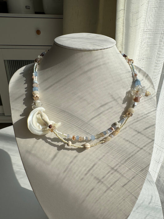 bouquet, dolphin and shell resort-style necklace