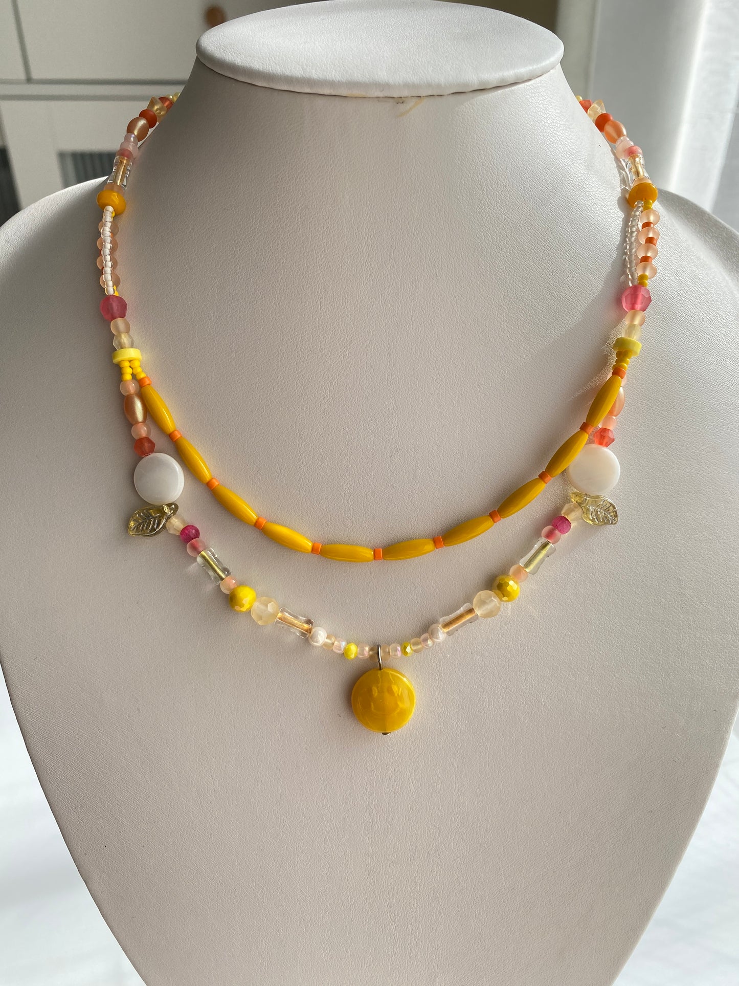 Orange-Yellow Smiley Face Necklace