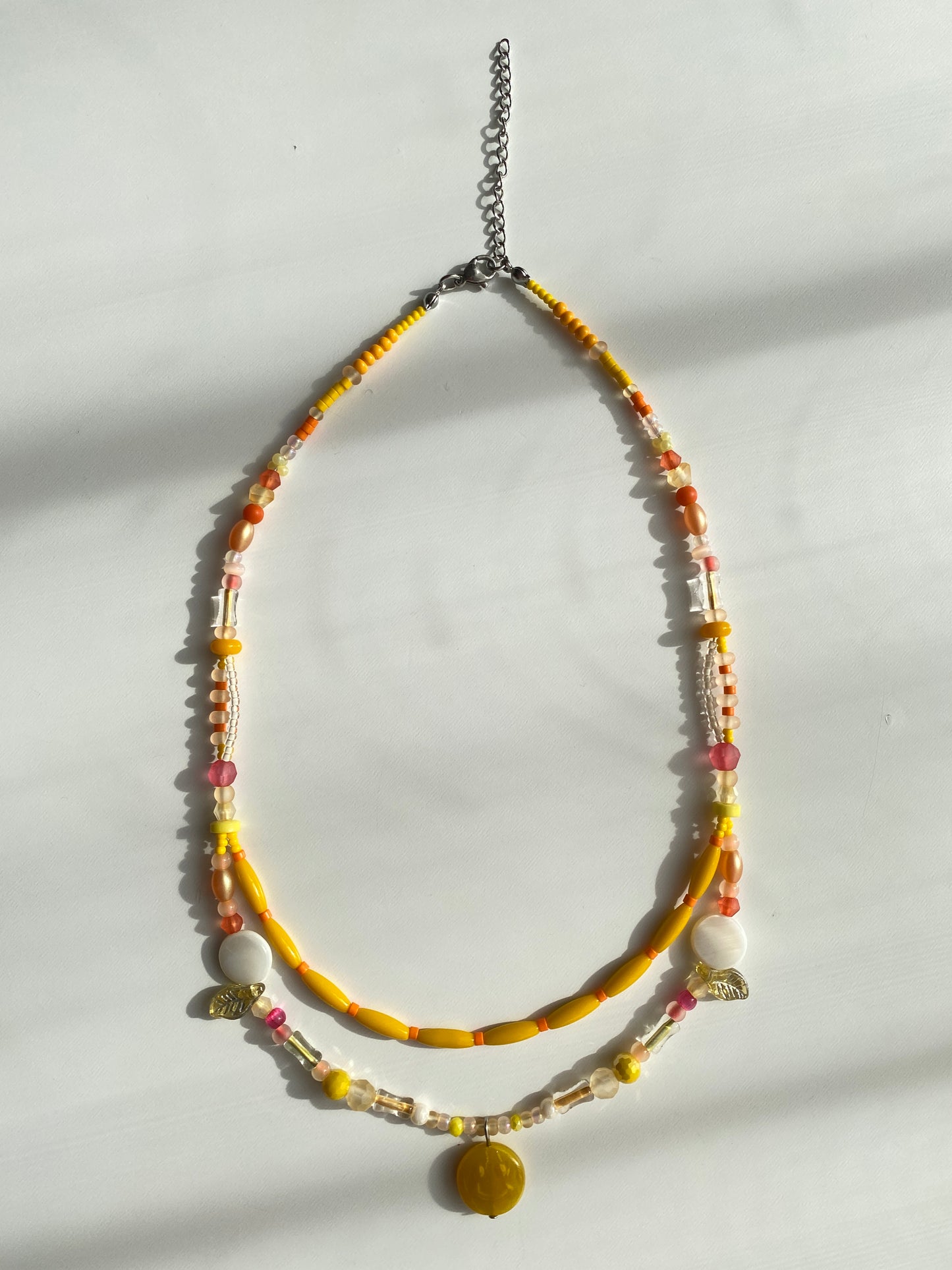 Orange-Yellow Smiley Face Necklace