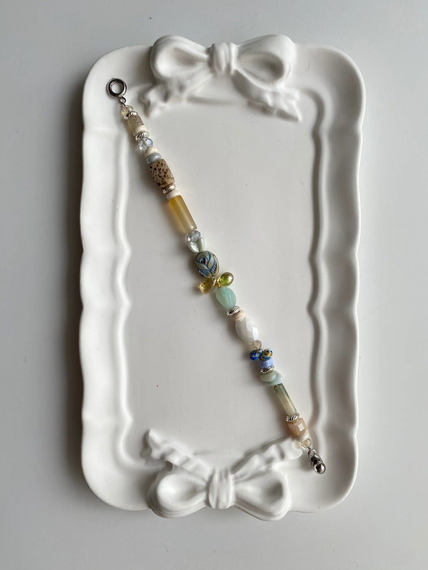 Dreamy Rose cool-toned beaded bracelet with Czech glass and silver accents.