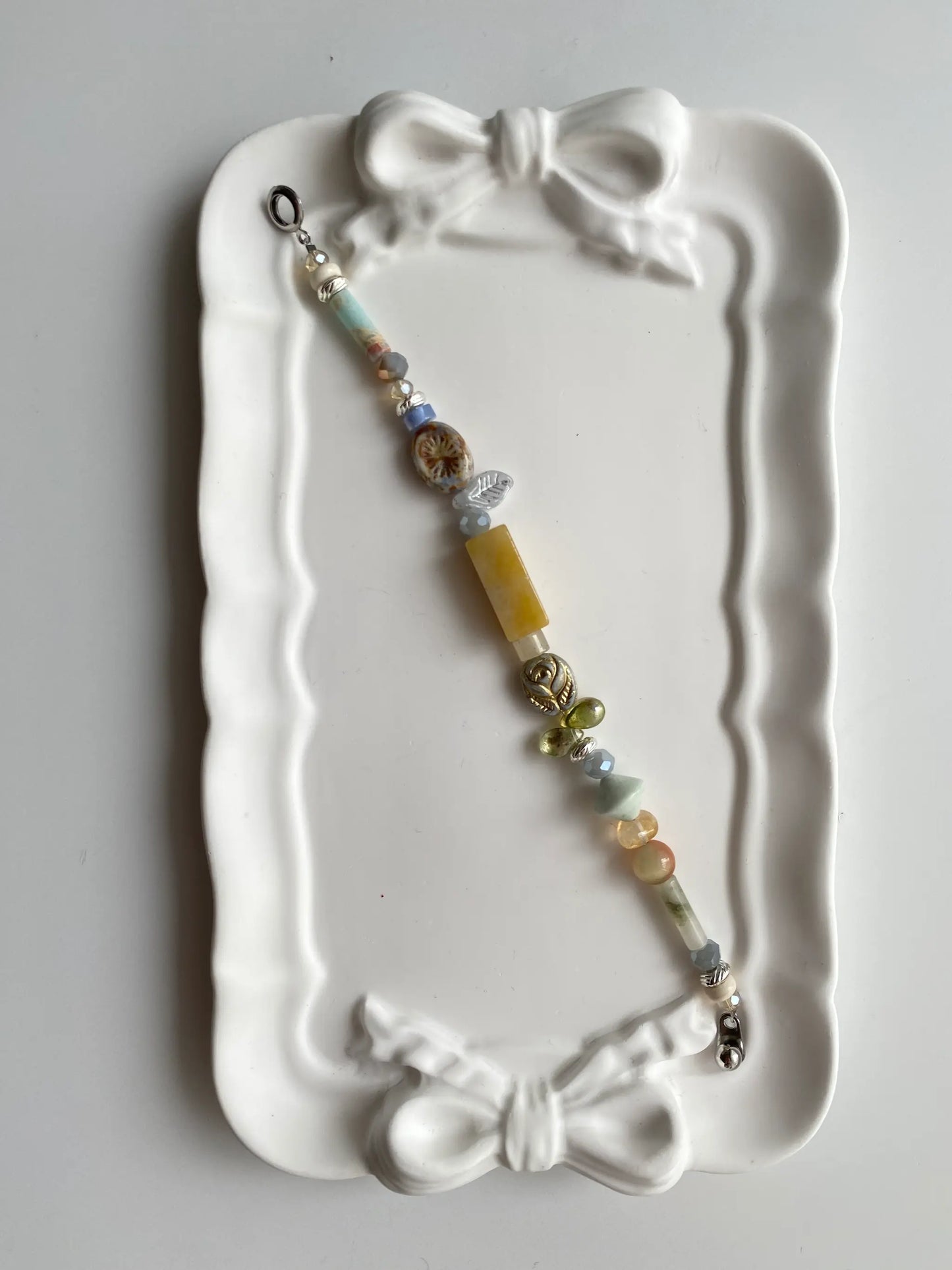 Rose Garden Milk Tea handmade bracelet with floral beads and natural stones.